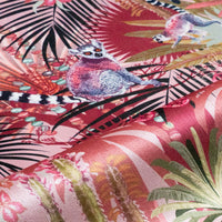 Treetop Tango velvet fabric in dawn pink photographed at an angle to show the subtle sheen