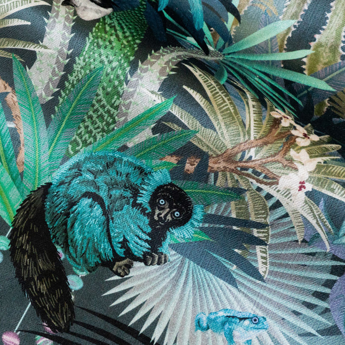 Close-up of the lemur on Treetop Tango dusky blue patterned velvet upholstery fabric