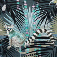 Close-up of the ring-tailed lemur on Treetop Tango dusky blue patterned velvet upholstery fabric