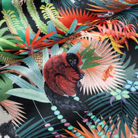 Soft velvet pile and fine print detail on dark colourful lemur print fabric