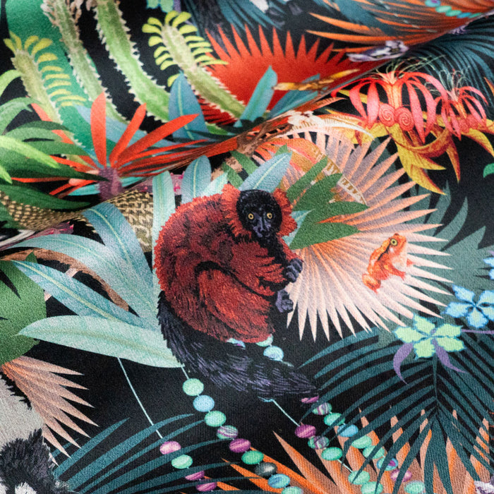 Soft velvet pile and fine print detail on dark colourful lemur print fabric