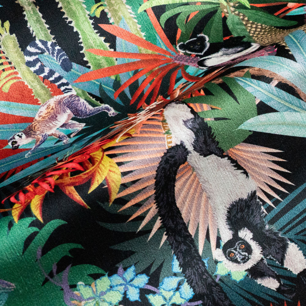 Treetop Tango velvet fabric in dark colourful photographed at an angle to show the subtle sheen