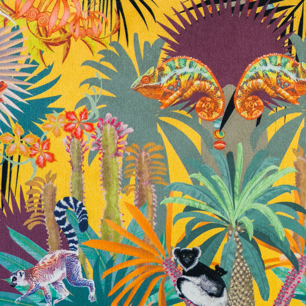 Detail of the panther chameleons and lemurs on sunshine yellow velvet furnishing fabric