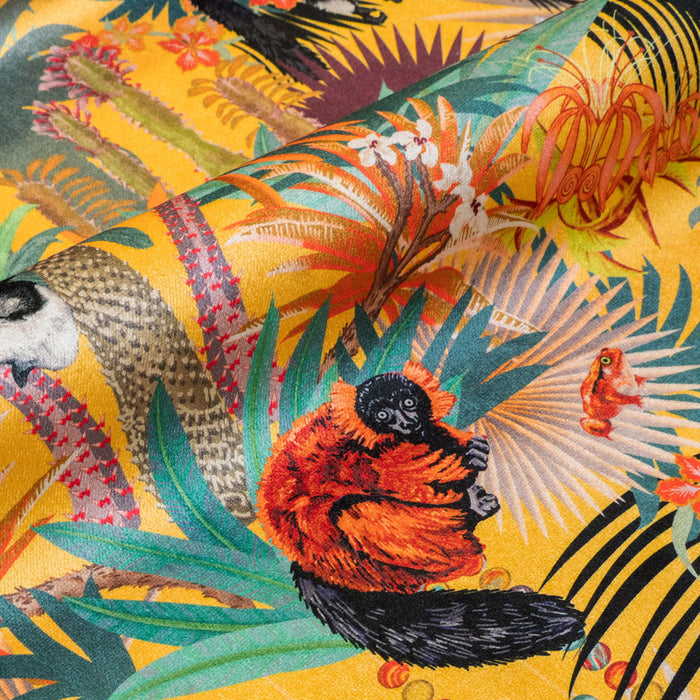Close-up of the Red-ruffed lemur on Treetop Tango sunshine yellow patterned velvet upholstery fabric