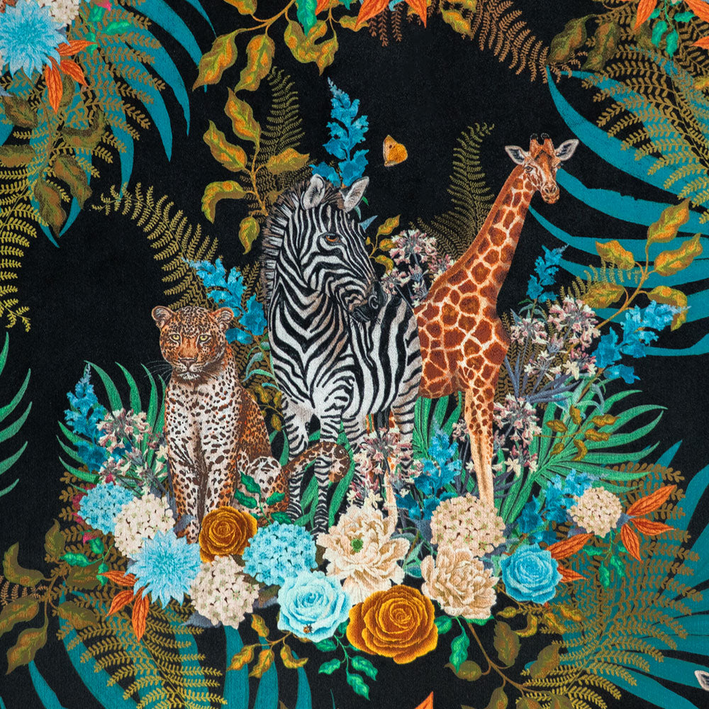 Close-up of African animals among blooming flowers on Wild Blooms  floral print velvet fabric in black