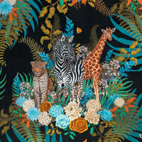 Close-up of African animals among blooming flowers on Wild Blooms  floral print velvet fabric in black