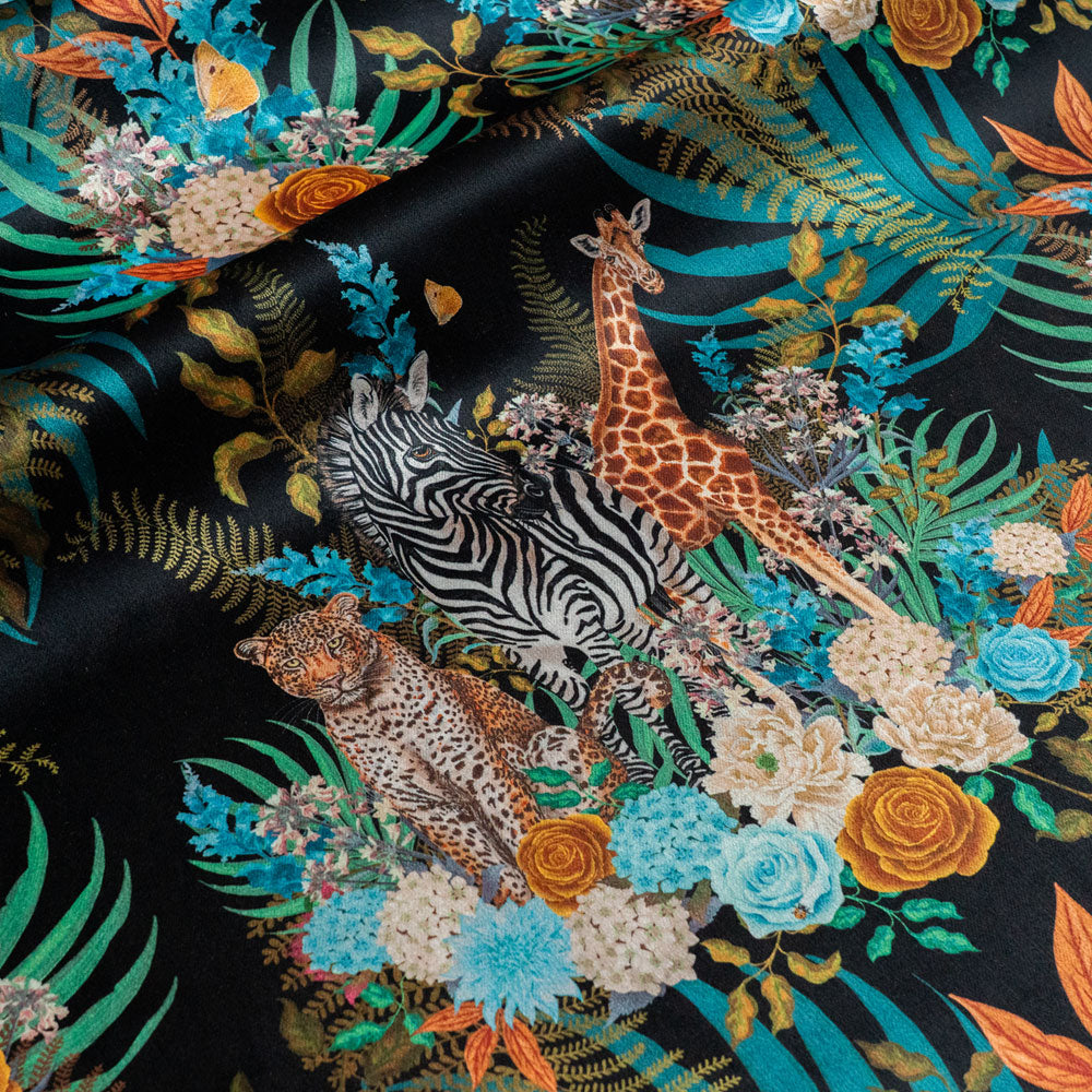 Wild Blooms black African animal and floral print designer velvet fabric by Becca Who, with leopards, zebras and giraffes among blooming flowers
