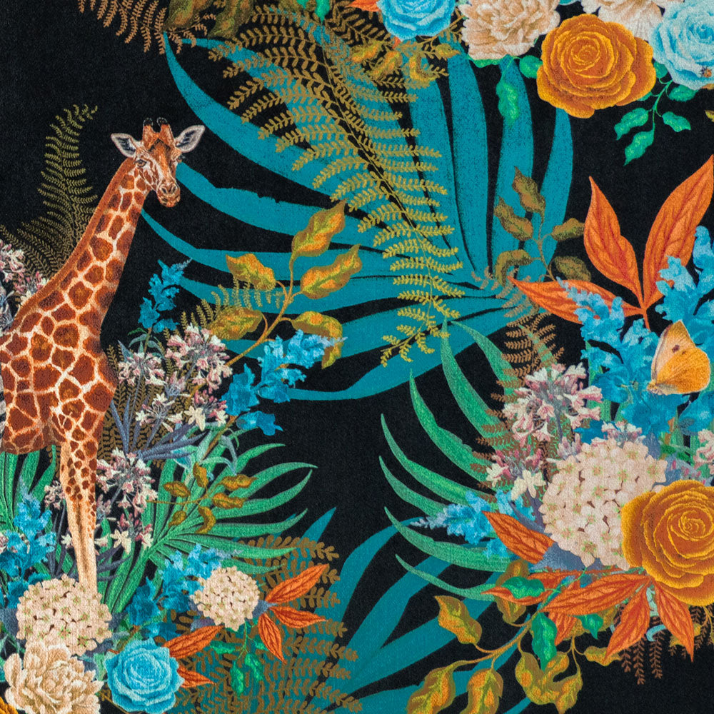 Detail of the giraffe and flowers on black African animal and floral print velvet furnishing fabric