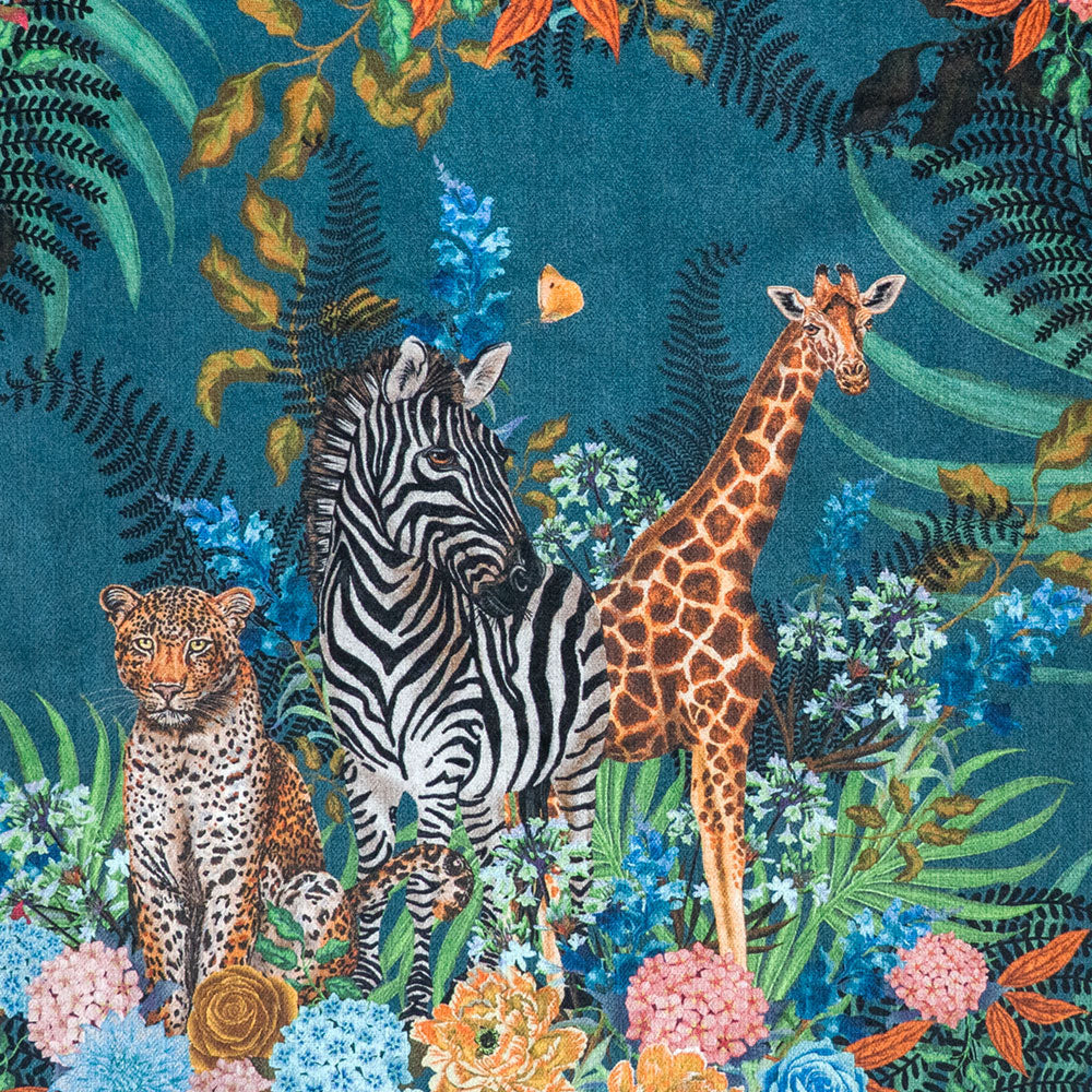 Detail of the zebra, leopard and giraffe  on blue African animal and floral print velvet furnishing fabric