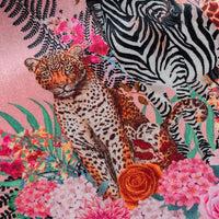Close-up of the leopard on Wild Blooms pink patterned velvet upholstery fabric