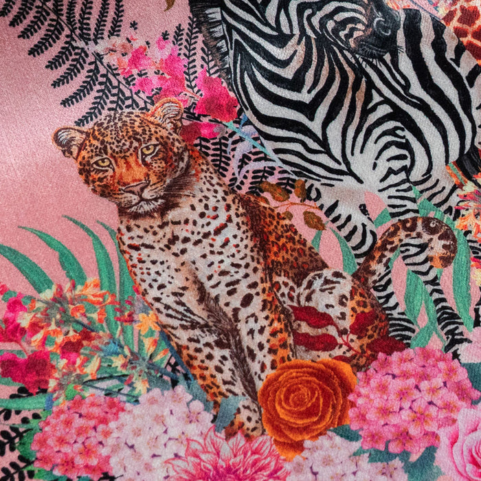 Close-up of the leopard on Wild Blooms pink patterned velvet upholstery fabric