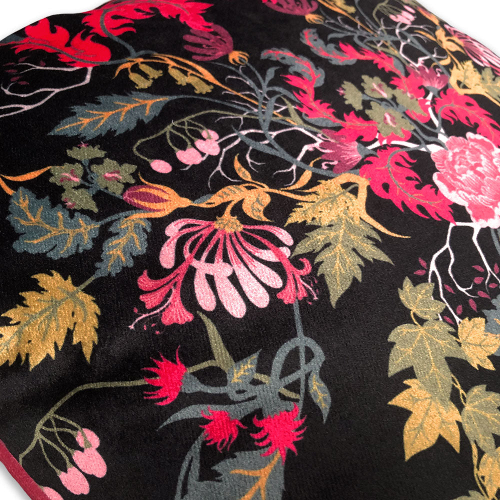 Dark Floral Detail from Printed Velvet Designer Cushion in Black and Pink