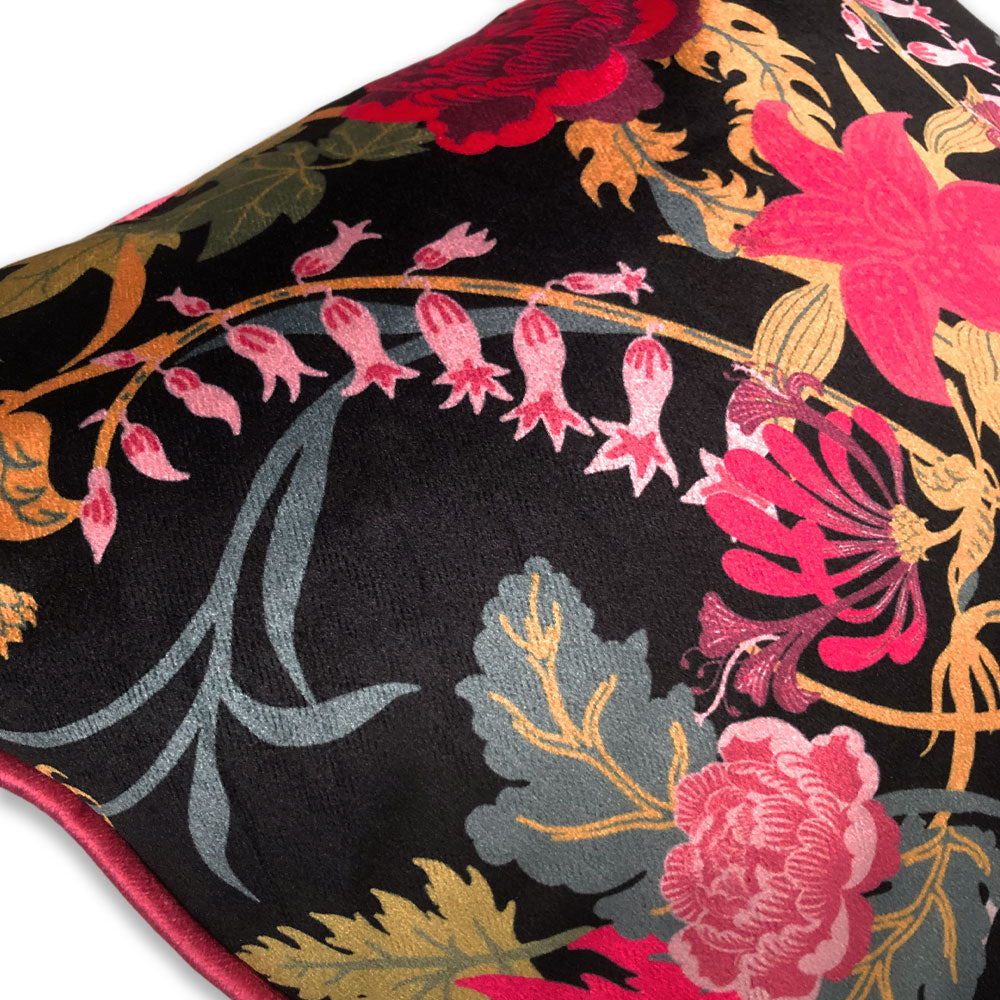 Close Up of Dark Floral Velvet Designer Cushion in Black and Pink
