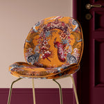 Designer Velvet Fabrics for interiors and upholstery from Becca Who with Indian wildlife pattern in Turmeric Orange Yellow