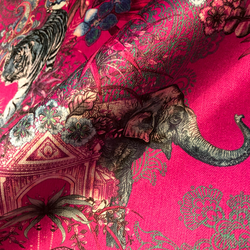Decorative velvet fabric in bright pink for curtains, soft furnishings and upholstery