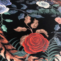 Close up of Rose on Becca Who Designer Soft Furnishings Fabric in Bengal Rose garden design in colourful Fierce