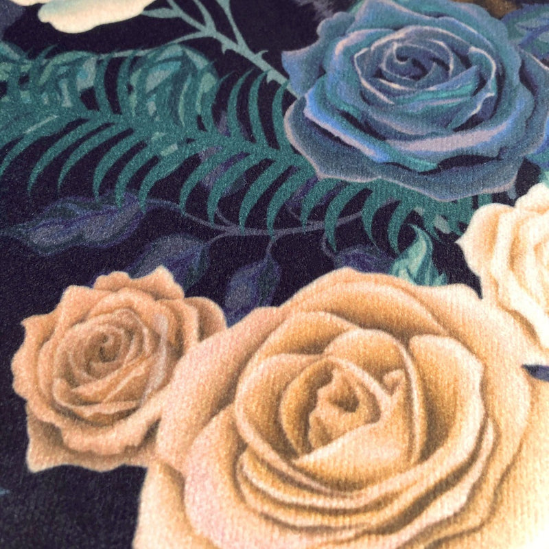 Close up velvet texture of Bengal Rose Garden velvet fabric with dark blue and floral print by Becca Who