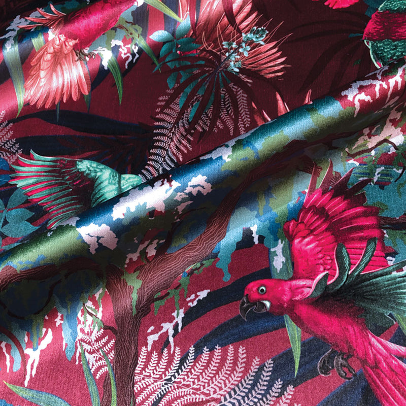 Rainforest Birds print on Velvet Fabric for Upholstery and Soft Furnishings in Interiors in Pink and Claret